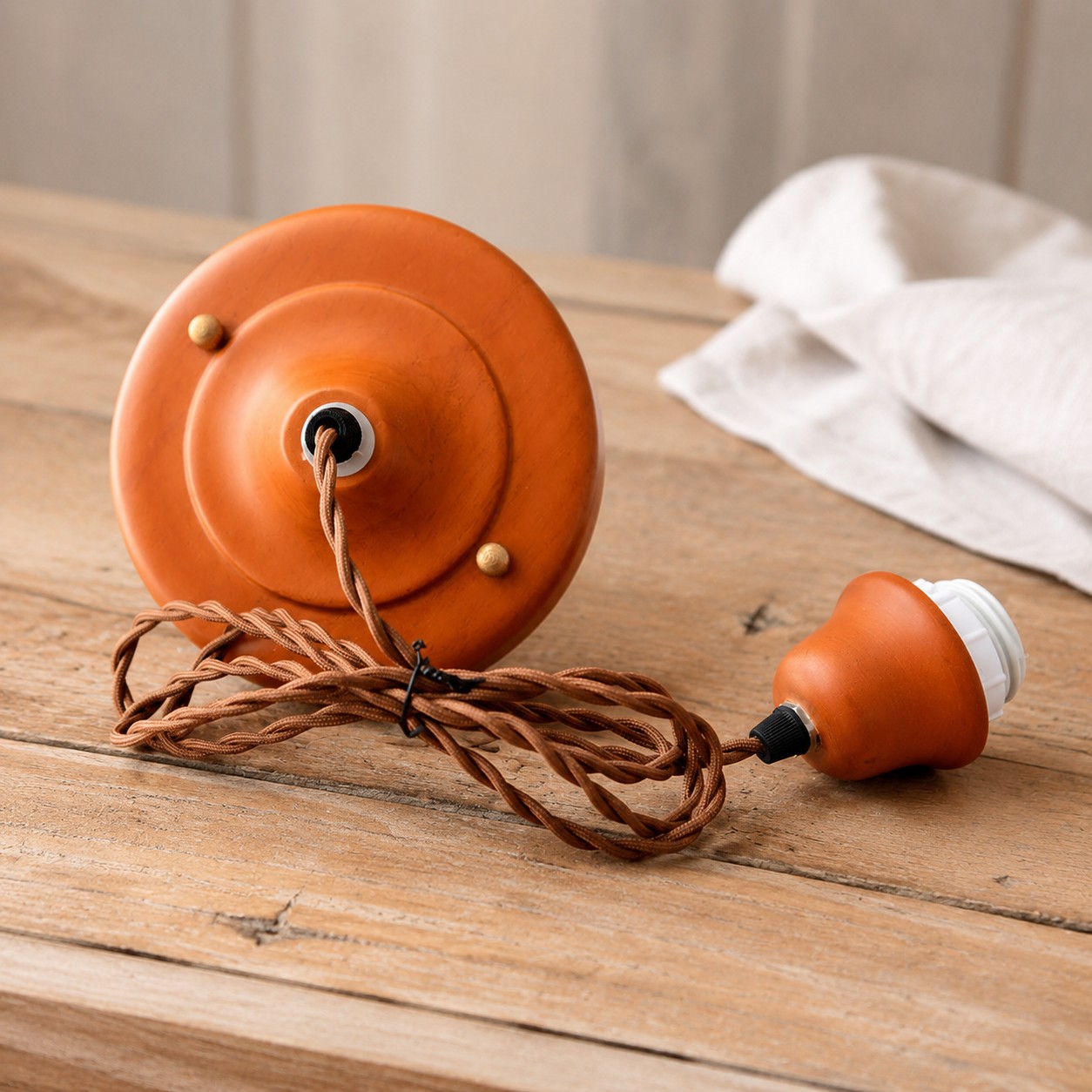 Pendant cord and ceiling hardware detail