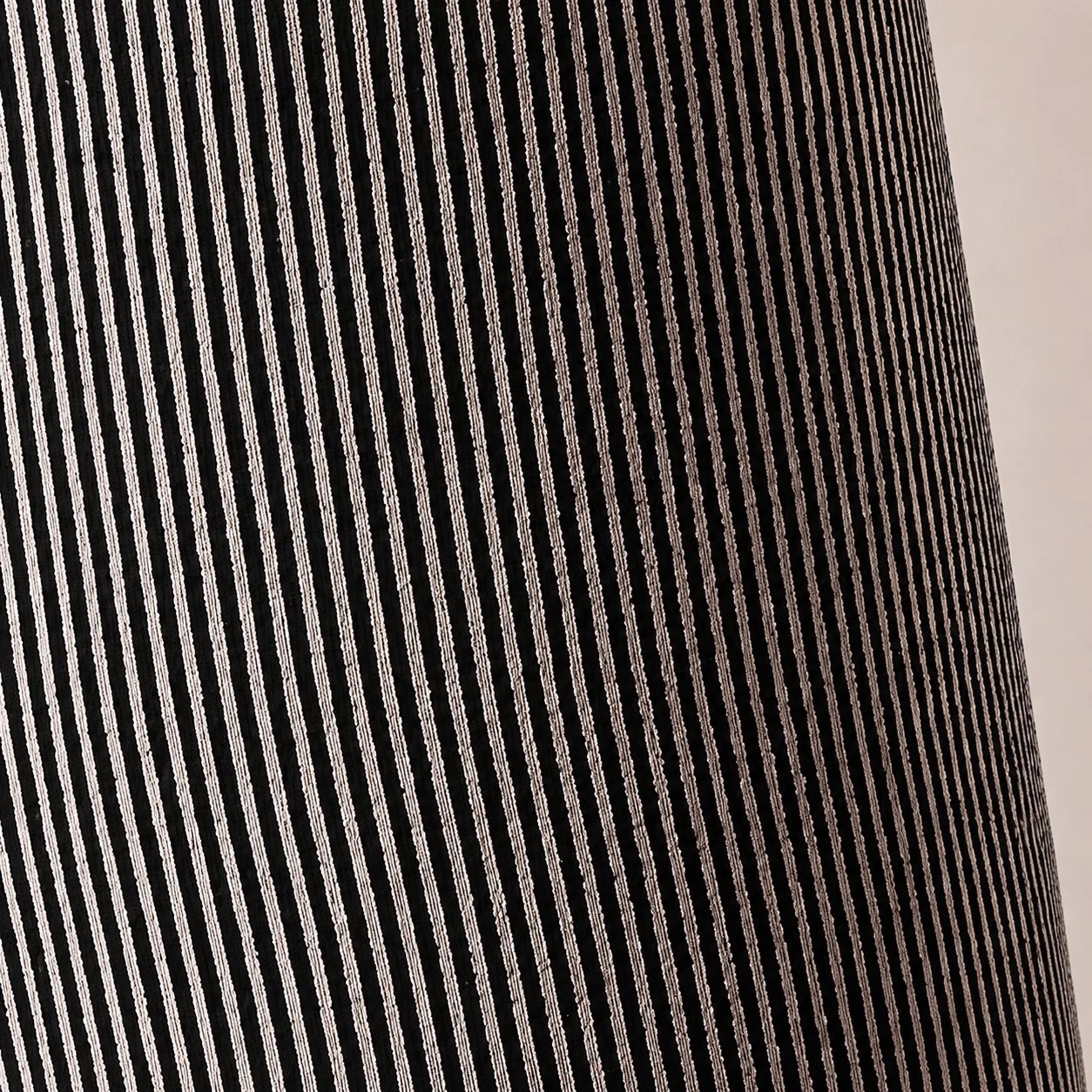 Close-up of gray striped fabric texture on the floor lamp