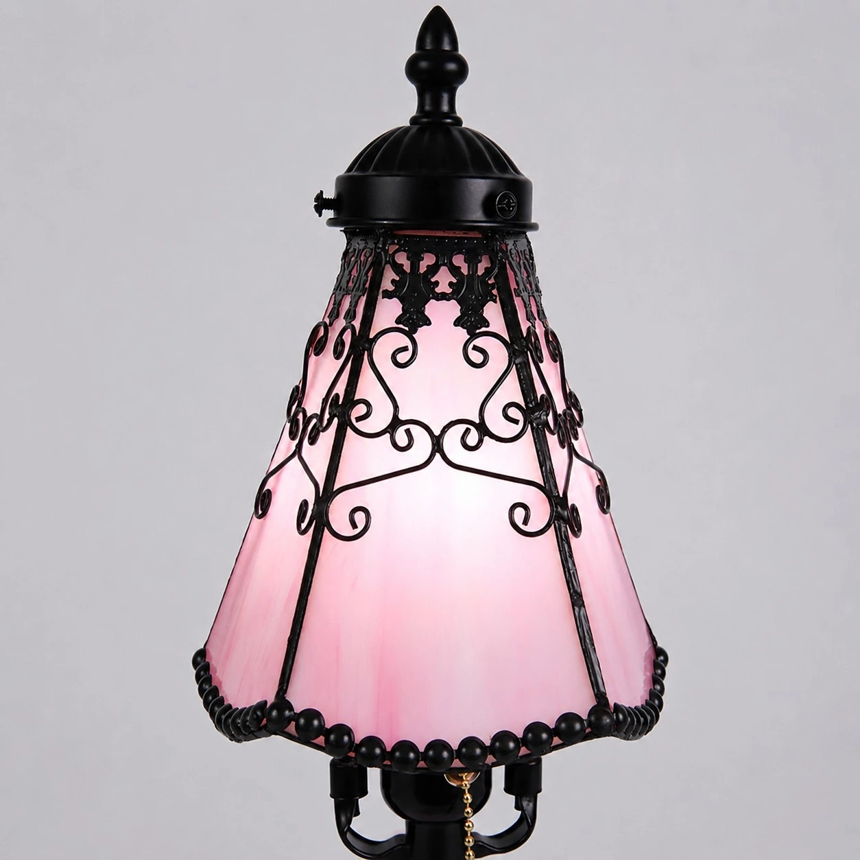 Pink glass shade with black metal trim