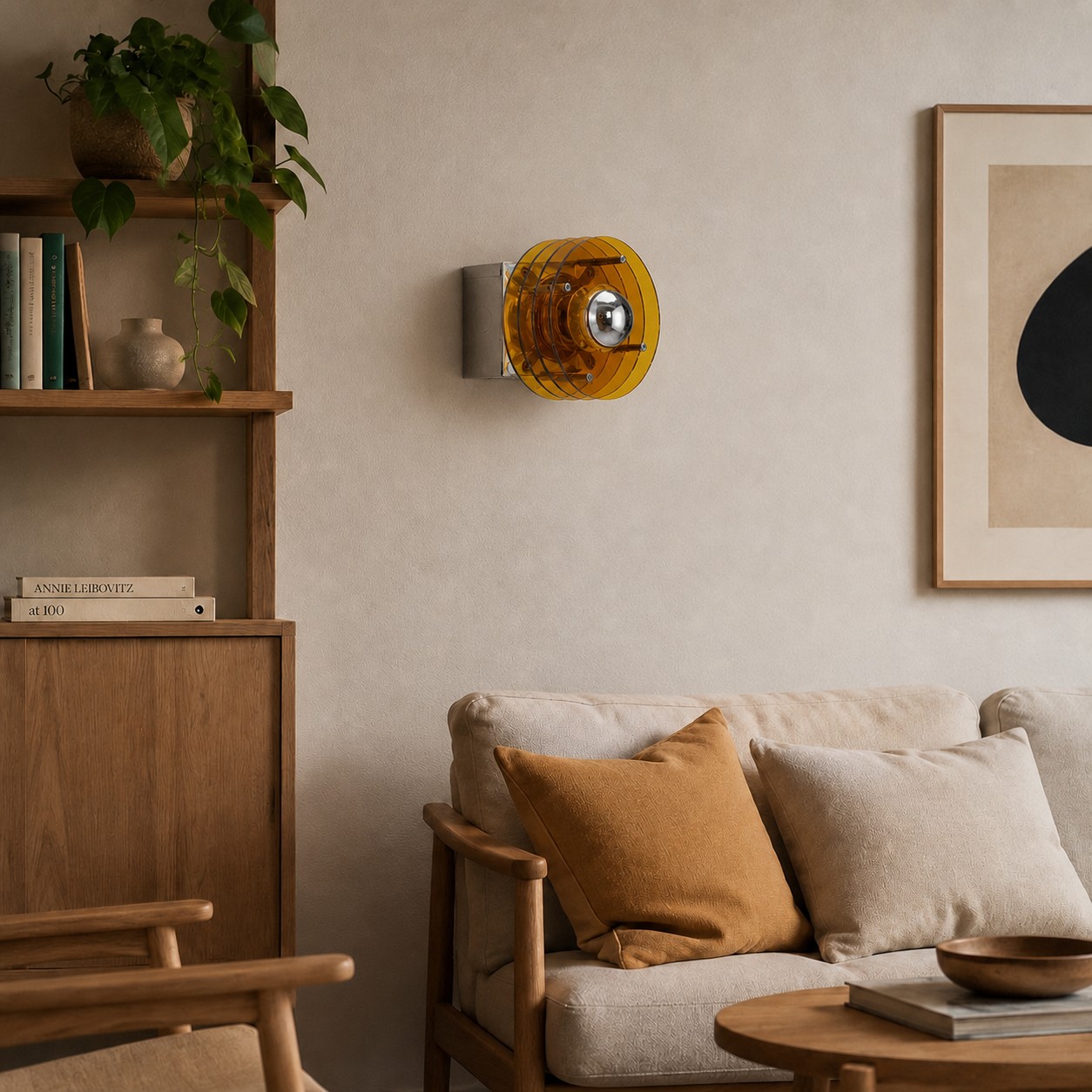 Amber acrylic wall lamp above a sofa in a warm living room