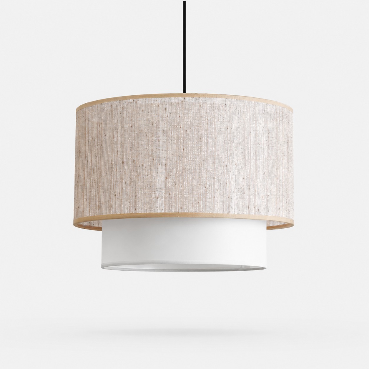 Wabi-sabi linen drum pendant lamp on a light background.