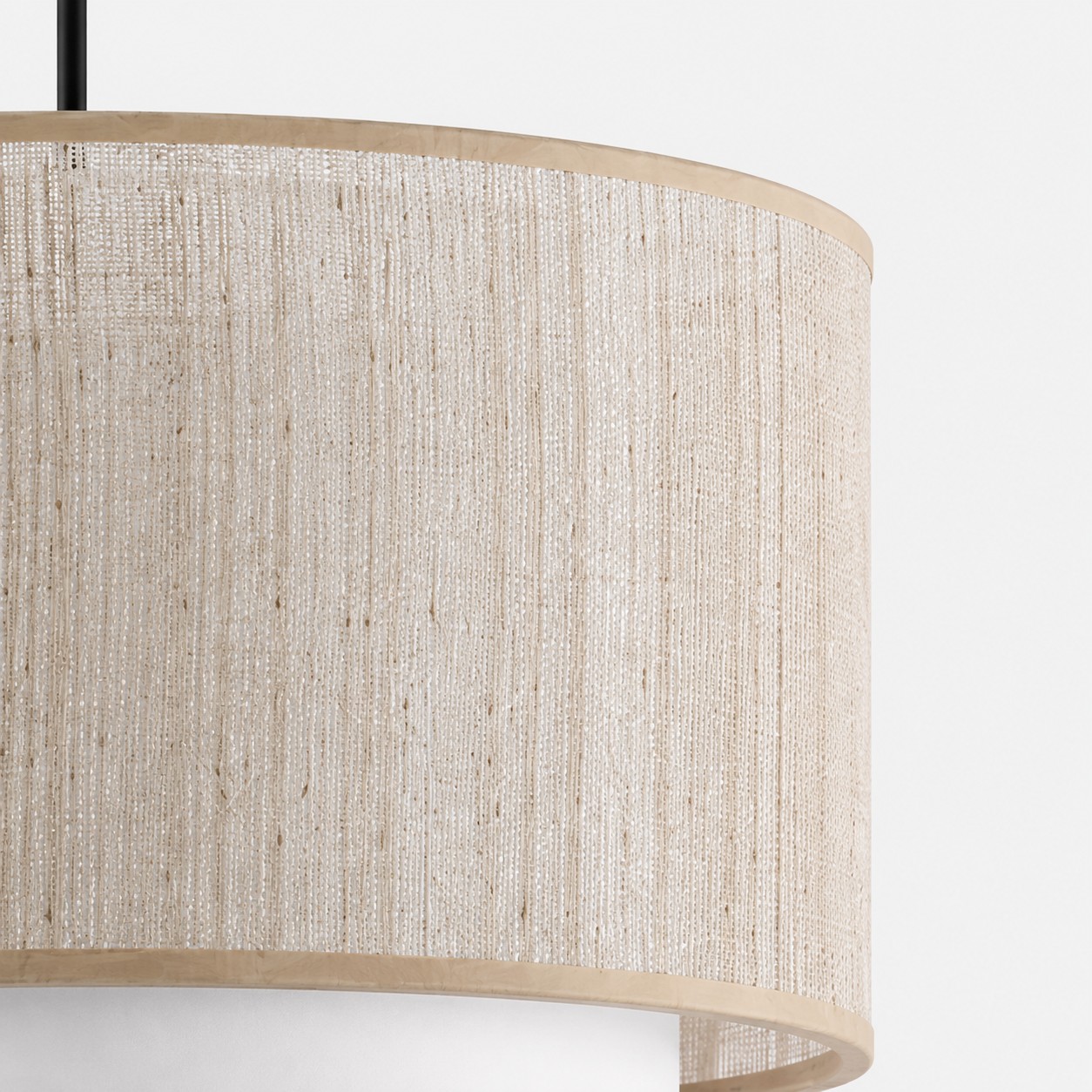 Close detail of natural linen texture on the drum shade.