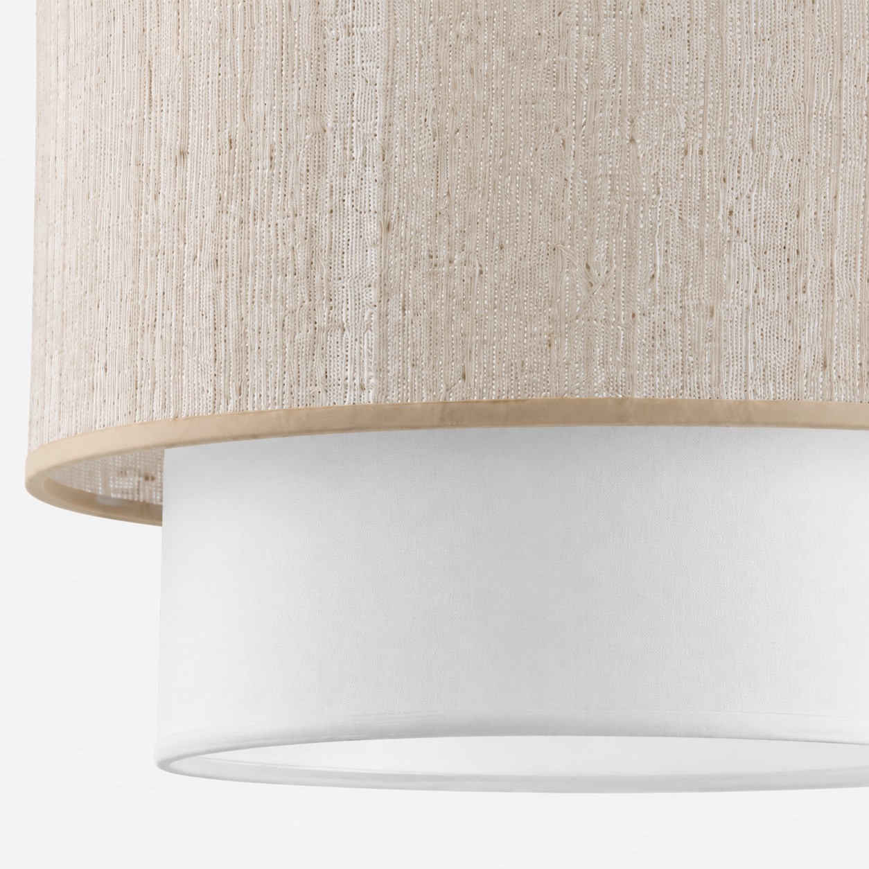 Side detail of the fabric shade edge and lower diffuser.