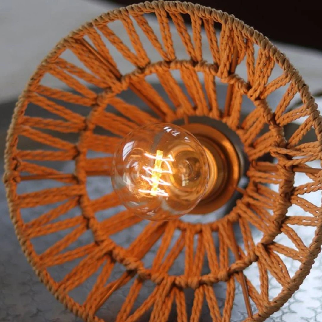 E27 bulb visible through the rattan pendant shade
