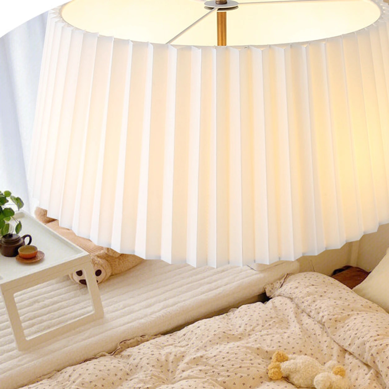 Tela chandelier shown at bedroom scale
