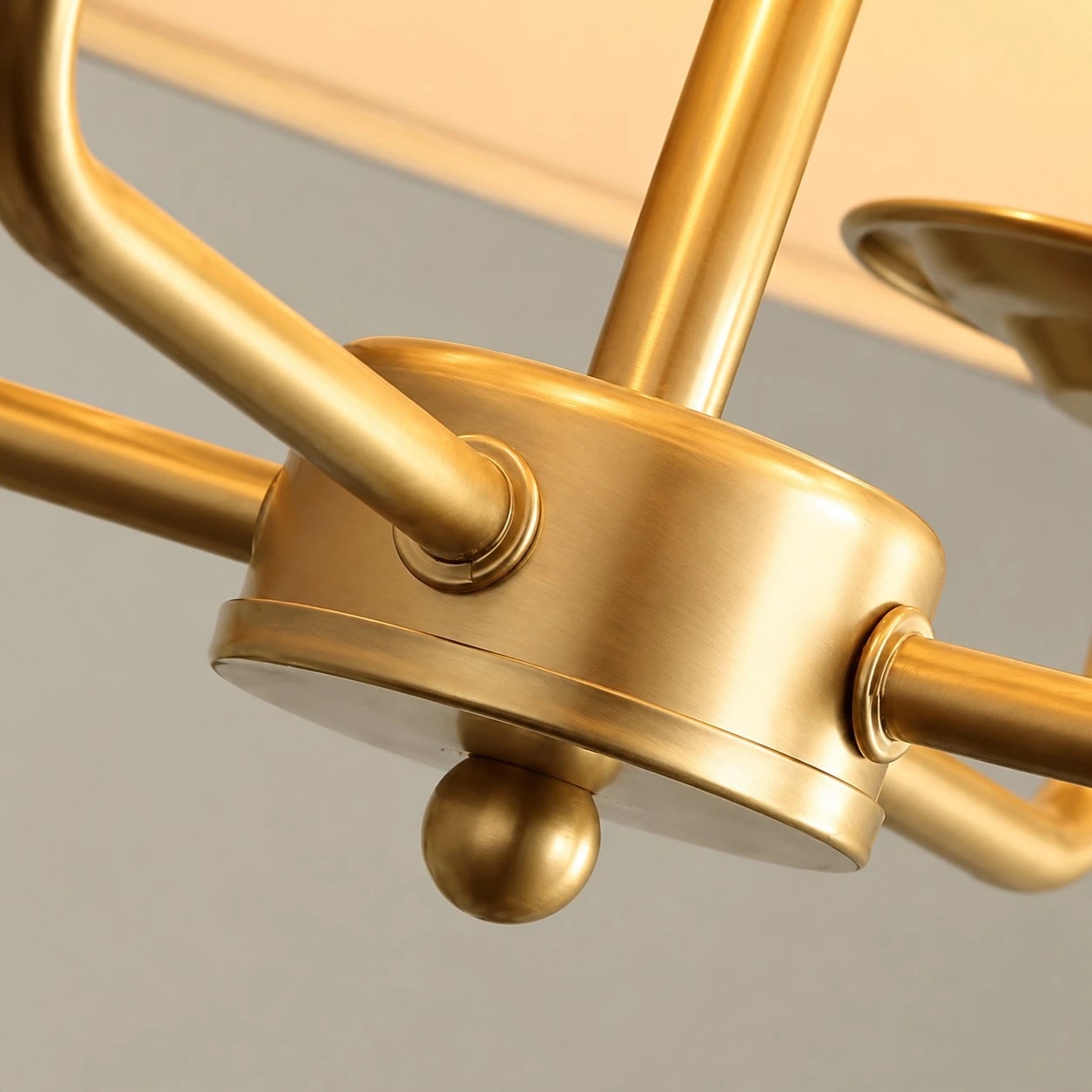 Tela brass central arm and joint detail