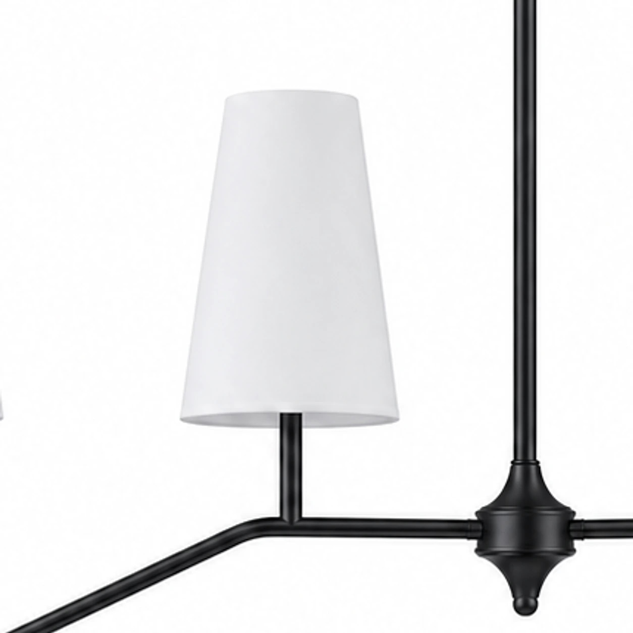 Black finish detail near white fabric shade and branch arm