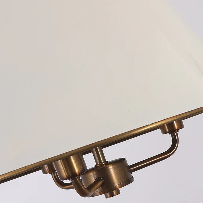 White shade edge with brass hardware detail