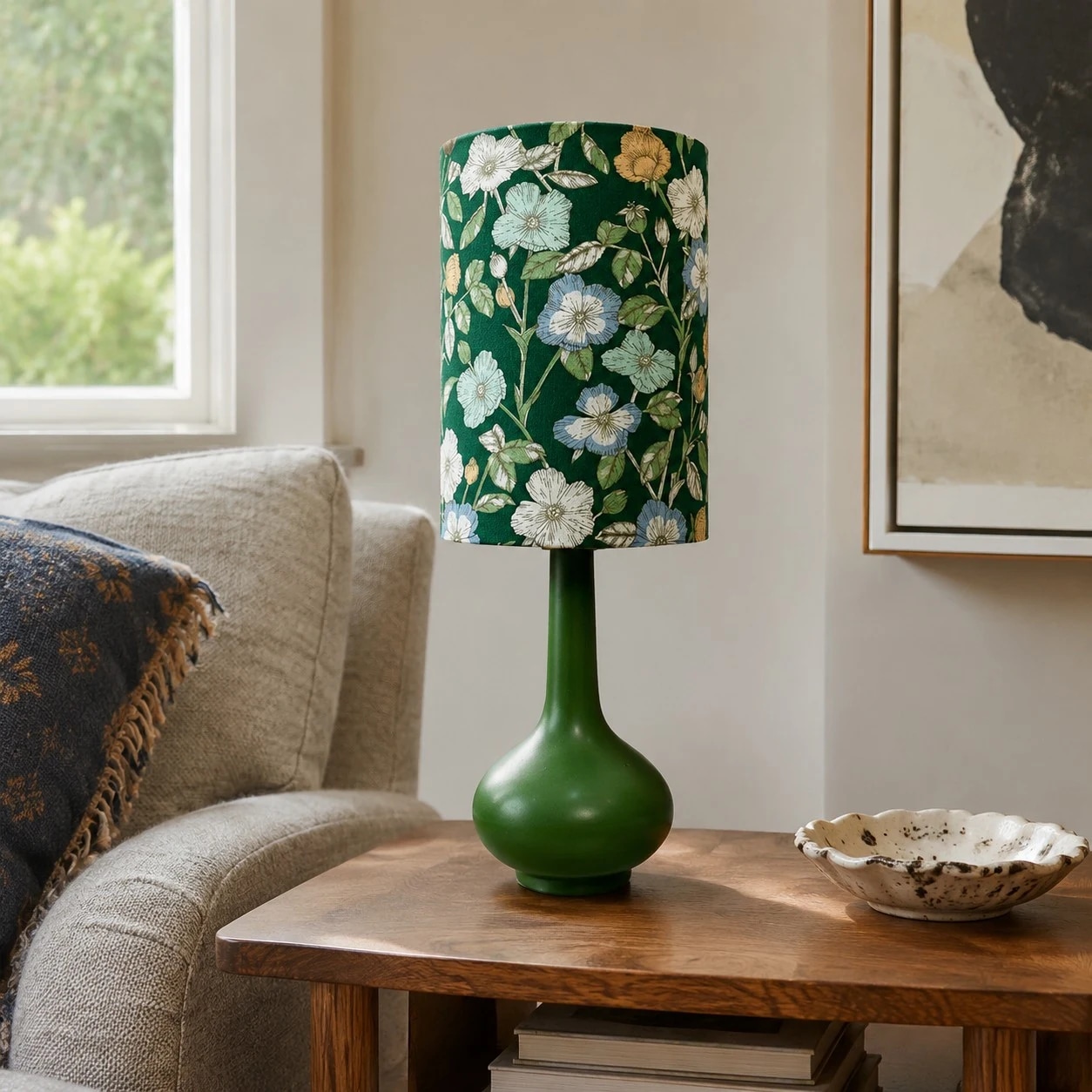 Glazed ceramic, fabric texture and a compact rounded silhouette.
